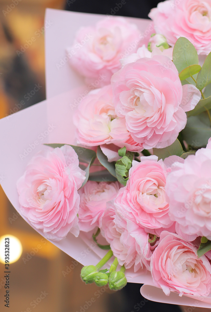 Big beautiful blossoming mono bouquet of pink ranunculus clooney hanoi flowers. Flower composition. Macro photo.