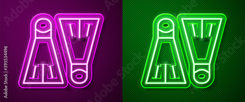 Glowing neon line Rubber flippers for swimming icon isolated on purple and green background. Diving equipment. Extreme sport. Sport equipment. Vector Illustration.