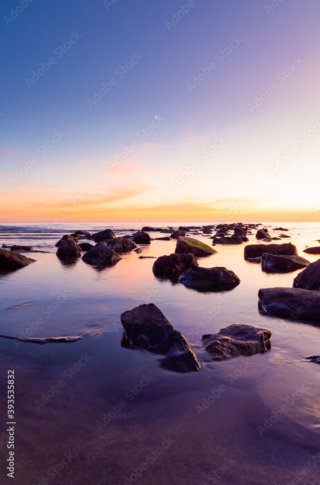 Beautiful Sunset over the Mediterranean Sea and its Rocks