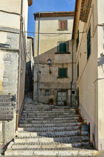 A narrow street among the old houses of Patrica  a medieval village in the Lazio region  Italy. 