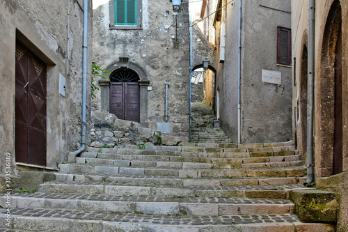 A narrow street among the old houses of Patrica  a medieval village in the Lazio region  Italy. 