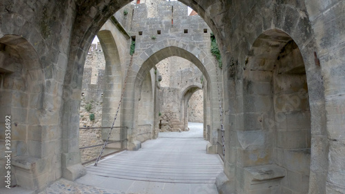 Fortifications of the medieval city of Carcassonne, France. The Narbonnaise gate, was built around 1280 during the reign of Philip III the Bold and was made up of two enormous spur towers.