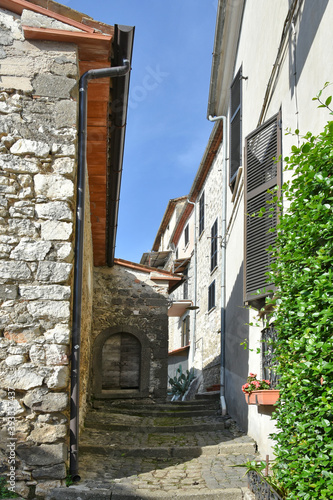 A narrow street among the old houses of Patrica, a medieval village in the Lazio region, Italy.
