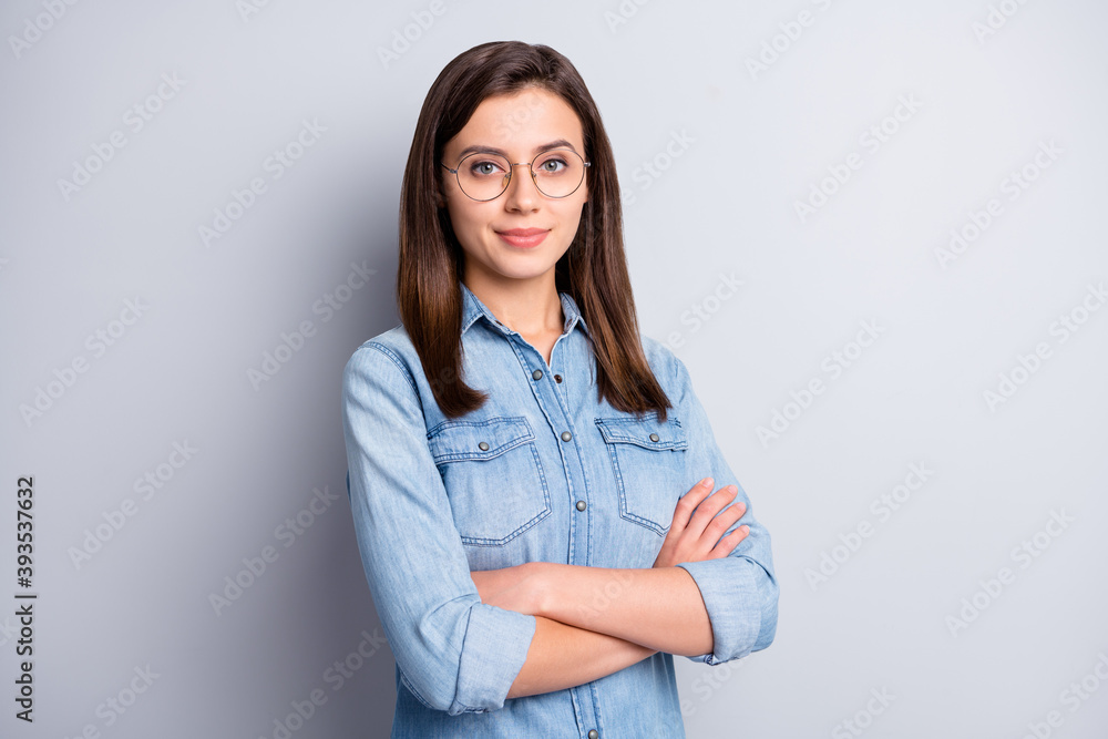 Portrait of nice intellectual brunette hairdo office worker crossed arms wear spectacles blue cloth isolated on grey background Portrait of nice intellectual brunette hairdo office worker crossed arms wear spectacles blue cloth isolated on grey background