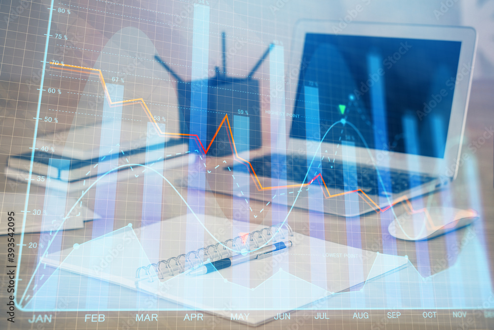 Forex market graph hologram and personal computer on background. Double exposure. Concept of investment.
