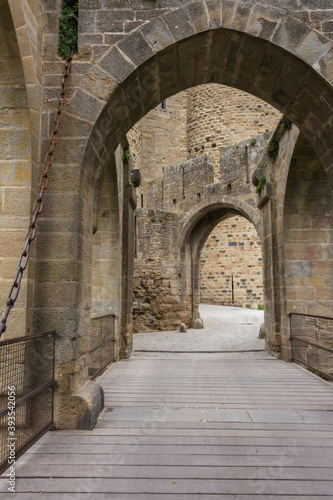 Fortifications of the medieval city of Carcassonne, France. The Narbonnaise gate, was built around 1280 during the reign of Philip III the Bold and was made up of two enormous spur towers.