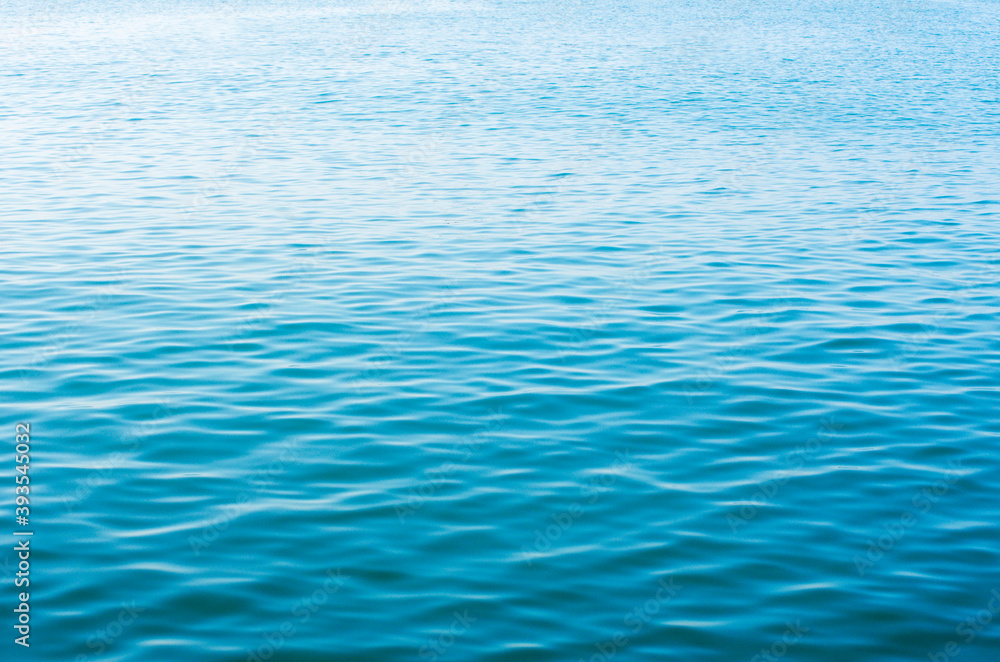 Obraz premium Blue sea water background texture