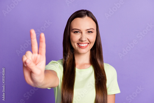 Wallpaper Mural Photo of satisfied person toothy smile show v-sign wear light green clothing isolated on magenta color background Torontodigital.ca