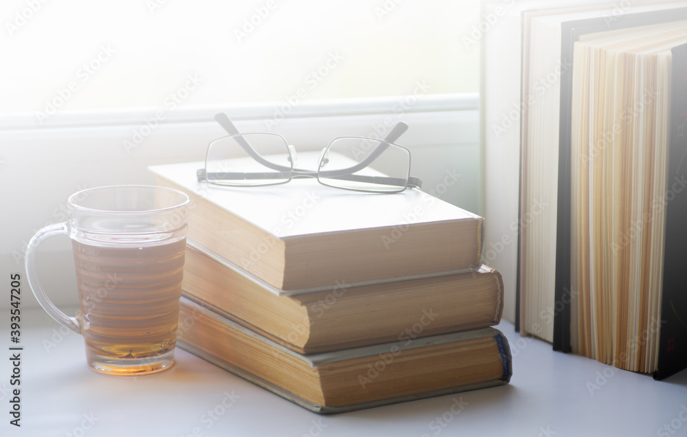 mug of hot tea and books mug of hot tea and books