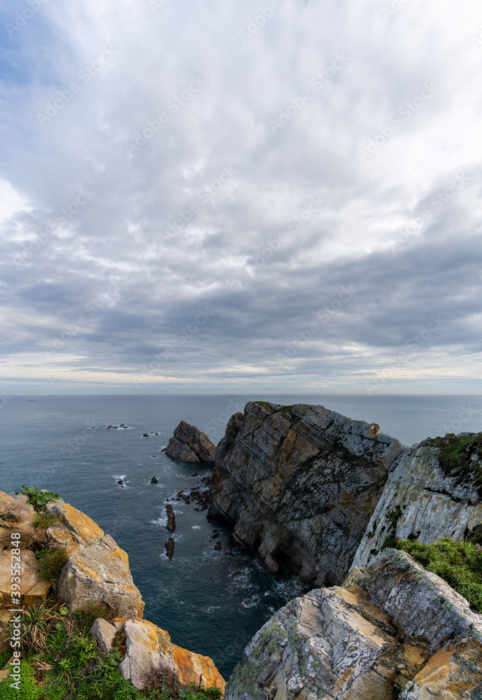 view of the wild and savage coast at the Cabo de Penas in Asturias