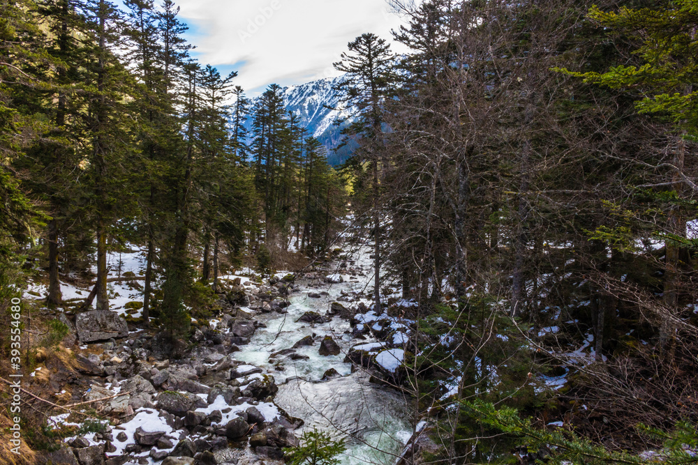 The Valley of Marcadau with the river Marcadau in winter. The heart of the ski station of Pont d’Espagne, Pyrenees National Park, Hautes-Pyrénées department, Occitanie, France. The Valley of Marcadau with the river Marcadau in winter. The heart of the ski station of Pont d’Espagne, Pyrenees National Park, Hautes-Pyrénées department, Occitanie, France.