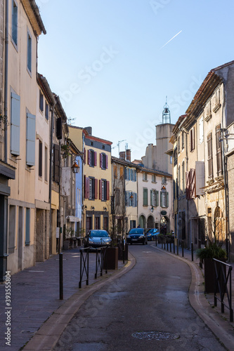 Carcassonne   France - March 11  2020 - The Cit   de Carcassonne is a medieval citadel in the department of Aude  Occitanie region. Picturesque typical narrow street Rue de la Trivalle.
