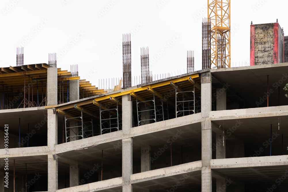 New car parking construction site with concrete frame and reinforcements