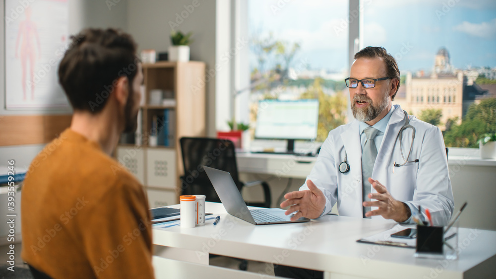 Fototapeta premium In a Doctor's Consultation Room: Experienced Physician Talks to the Patient, about Test Results, Symptoms, Explaining Treatment Plan, and Prescribes Medicine. Health Care Specialist 