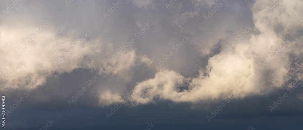 cloudscape with stormy weather and beautiful clouds on dark sky