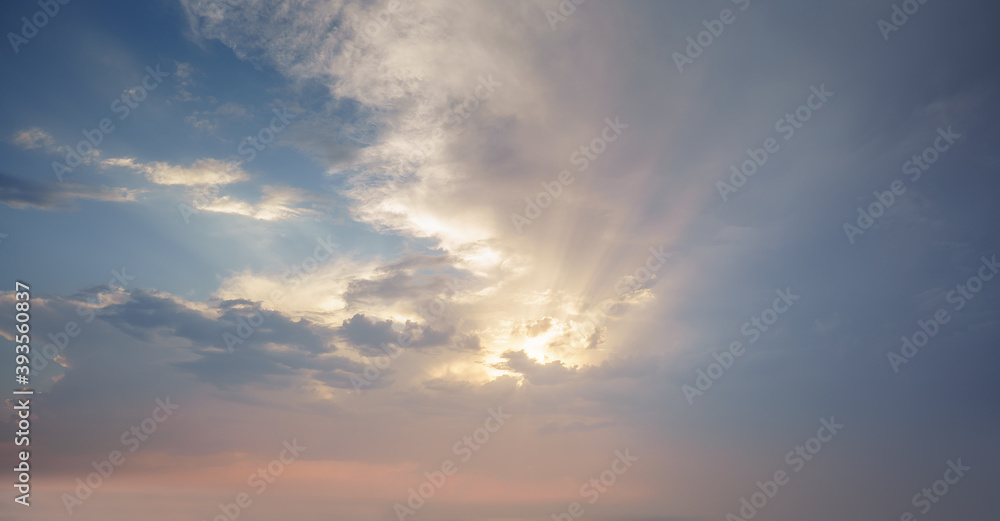 Hope concept with sun rays on a dramatic sky
