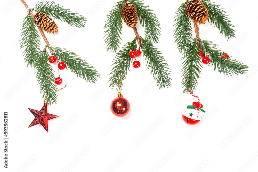 Christmas composition. Spruce branches with New Year's decorations on a white background. Flat lay, top view, copy space