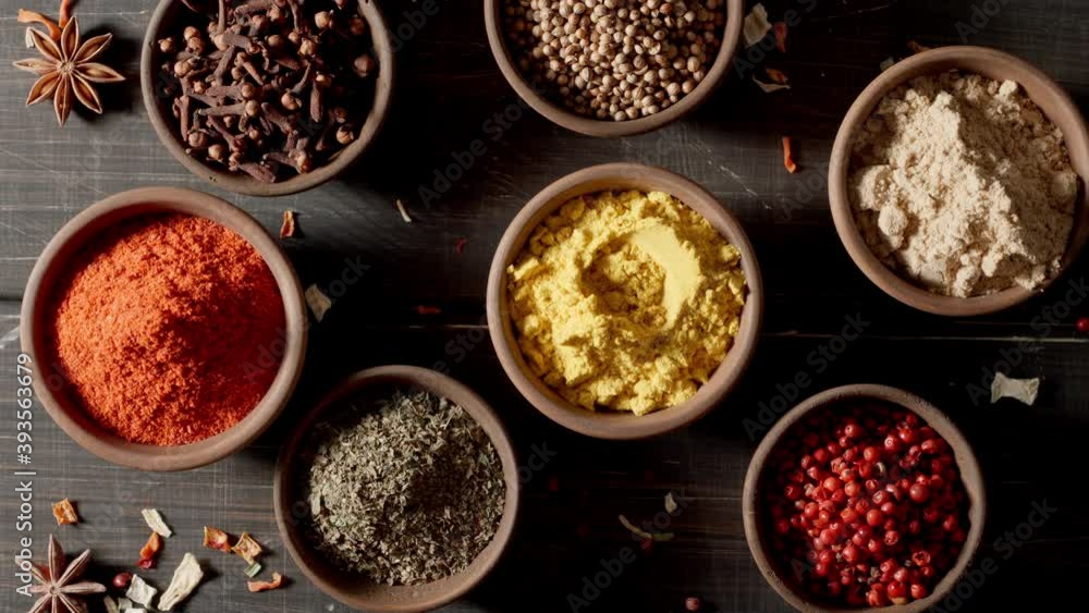 TOP VIEW: Spices and herbs. Variety of colourful seasoning. Chef cooking. TOP VIEW: Spices and herbs. Variety of colourful seasoning. Chef cooking.