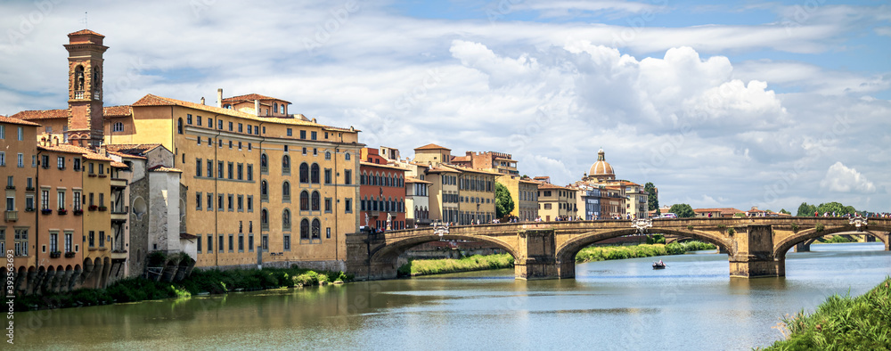 The embankment and bridge of the Ponte Santa Trinita in Florence, Italy. Panorama