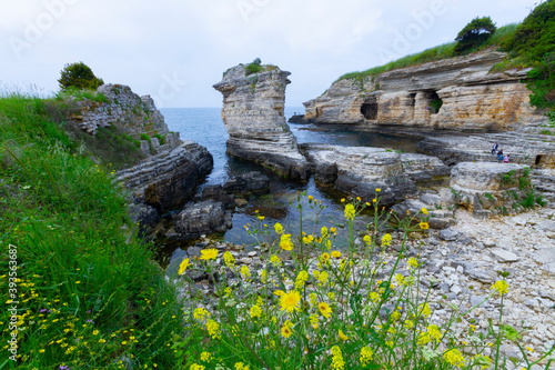 Fototapeta Naklejka Na Ścianę i Meble -  The cliffs formed by the effect of waves and wind processed Kerpe Kartal Cliffs like an architect. Kerpe Rocks are the hidden beauty of Kocelia.
