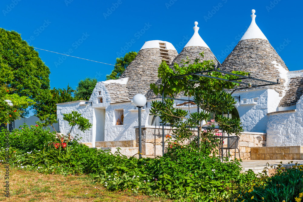 Olive trees and trulli of the Itria valley. Puglia