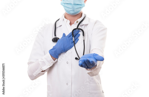 Young doctor in white uniform and stethoscope wearing mask on isolated background