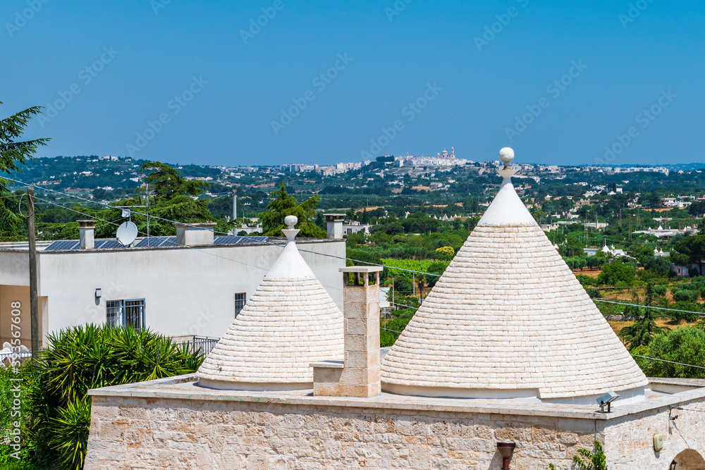 Olive trees and trulli of the Itria valley. Puglia