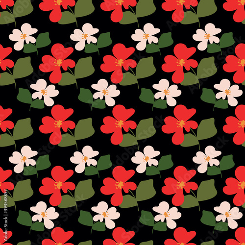 Bright red and white flowers on a black background. Seamless botanical pattern.