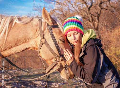 Woman and horse, landscape autumn