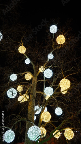 neon, glowing balls on a tree