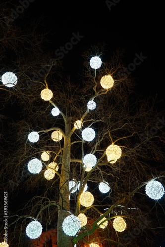 neon, glowing balls on a tree