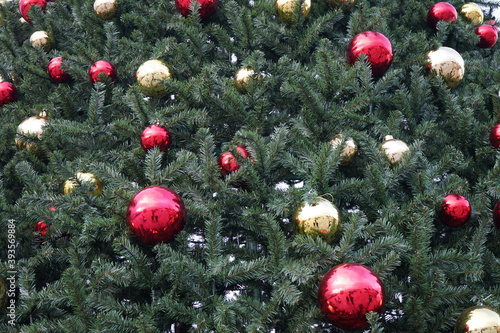 christmas tree with multi-colored balls and decorations background