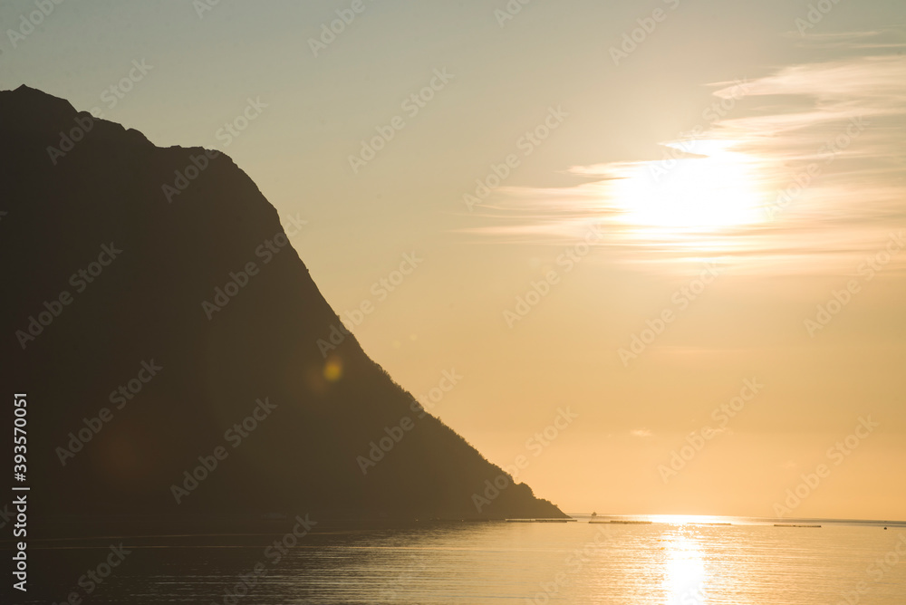 sunset over the sea and mountains