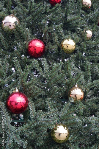 christmas tree with multi-colored balls and decorations background