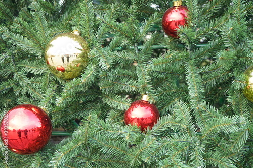 christmas tree with multi-colored balls and decorations background