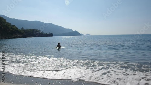 Children swim in the sea. Turkish Riviera Mediterranean coast of Antalya Province in Turkey.