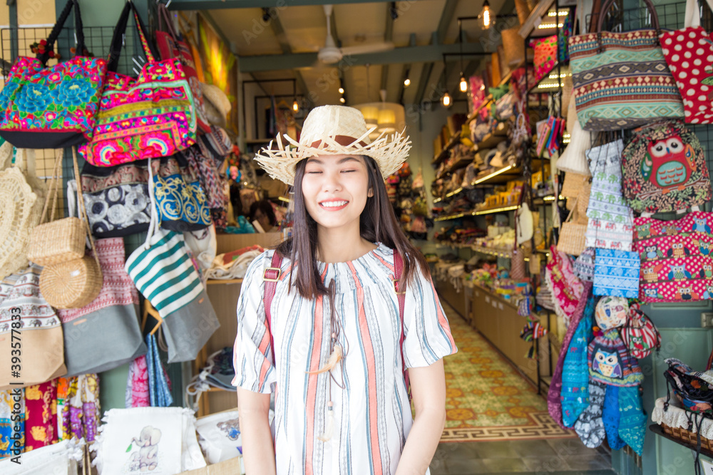Woman travel in Bangkok city enjoy shopping in souvenir shop weekend market Woman travel in Bangkok city enjoy shopping in souvenir shop weekend market