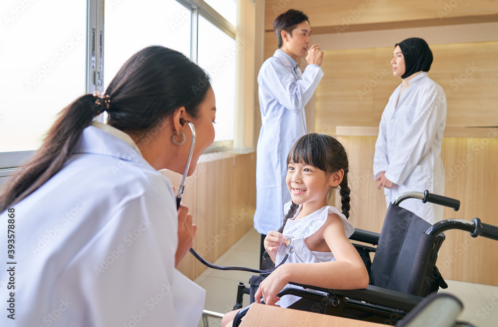 Doctor checkup smiling child girl with stethoscope in hospital Doctor checkup smiling child girl with stethoscope in hospital