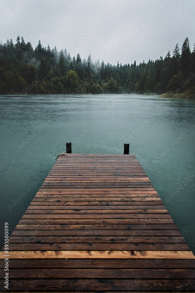 Naklejka premium wooden pier on lake
