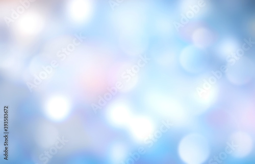 Winter blurred background,blue bokeh texture.Shining and glowing backdrop.Christmas illustration.New year blur.