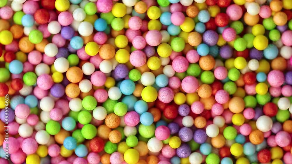 Multicolored balloons top view with circular rotation as background and texture. Holiday and fun concept. Slime Balls Pool with balls for fun and play, flat lay. Multicolored balloons top view with circular rotation as background and texture. Holiday and fun concept. Slime Balls Pool with balls for fun and play, flat lay.