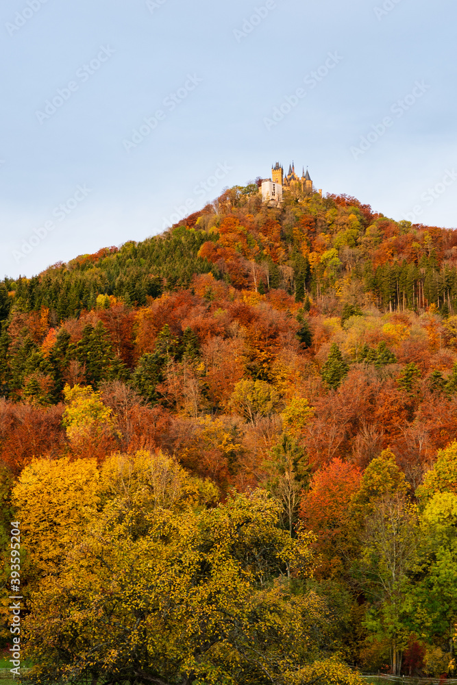 scenic autumn fall color in the Hohenzollern mountains in morning light Hechingen