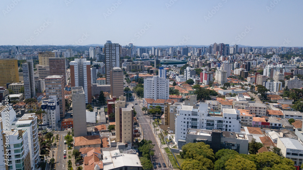 Drone image taken which shows a panoramic view of the Alto da XV neighborhood in Curitiba, capital of the state of Paraná, Brazil, with its buildings and trees