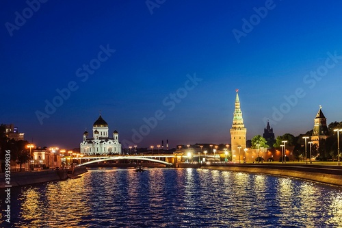 View of the Annunciation tower, Vodovzvodnaya tower, Borshaya Kamenny bridge and the Cathedral of Christ the Savior in the late evening in August. Moscow, Russia.