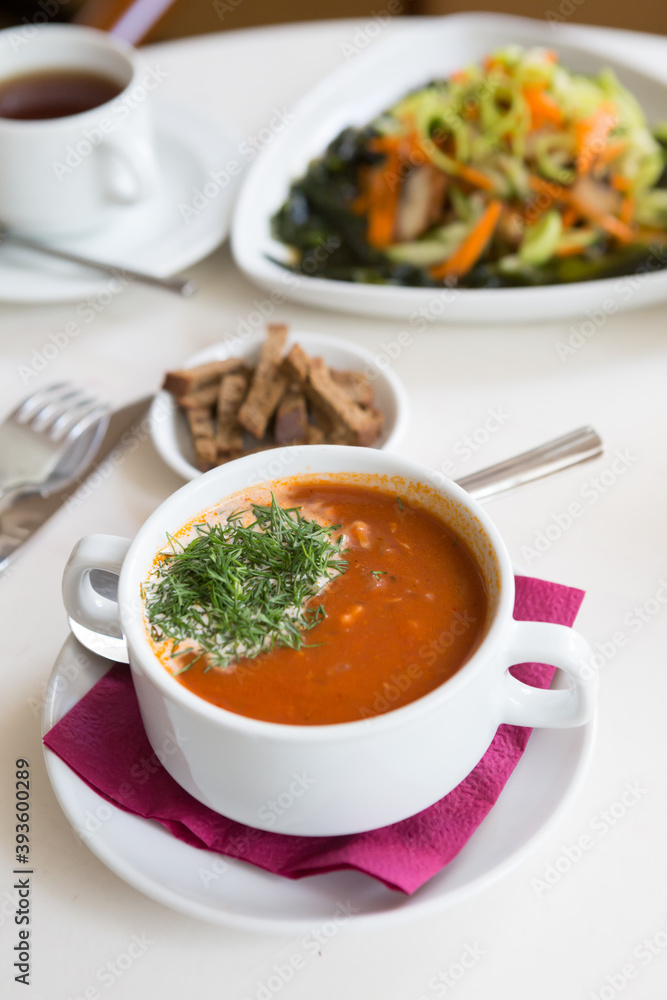 Bowl of red tomato soup with croutons Bowl of red tomato soup with croutons