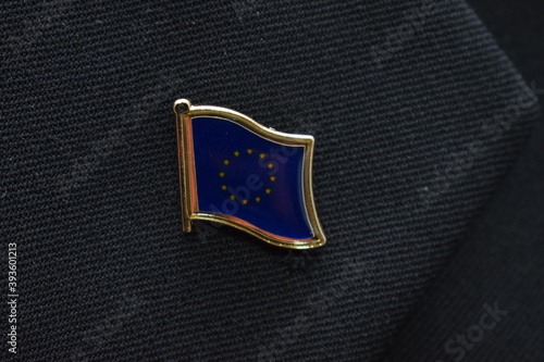 European Union Flag lapel pin on a suit