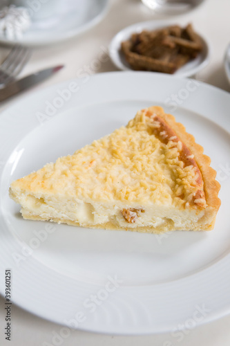 Traditional french quiche pie served on a table