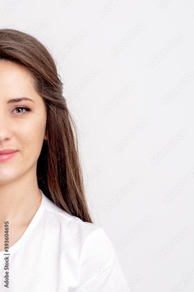 Half portrait of young female thepatist looking at camera on white background Half portrait of young female thepatist looking at camera on white background