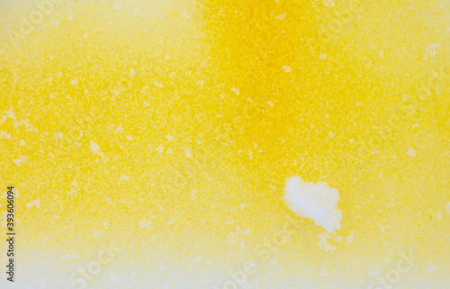 Yellow paint on the snow in winter.