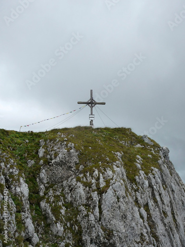 Summit cross Pyramidenspitze mountain hiking tour in Tyrol, Austria photo